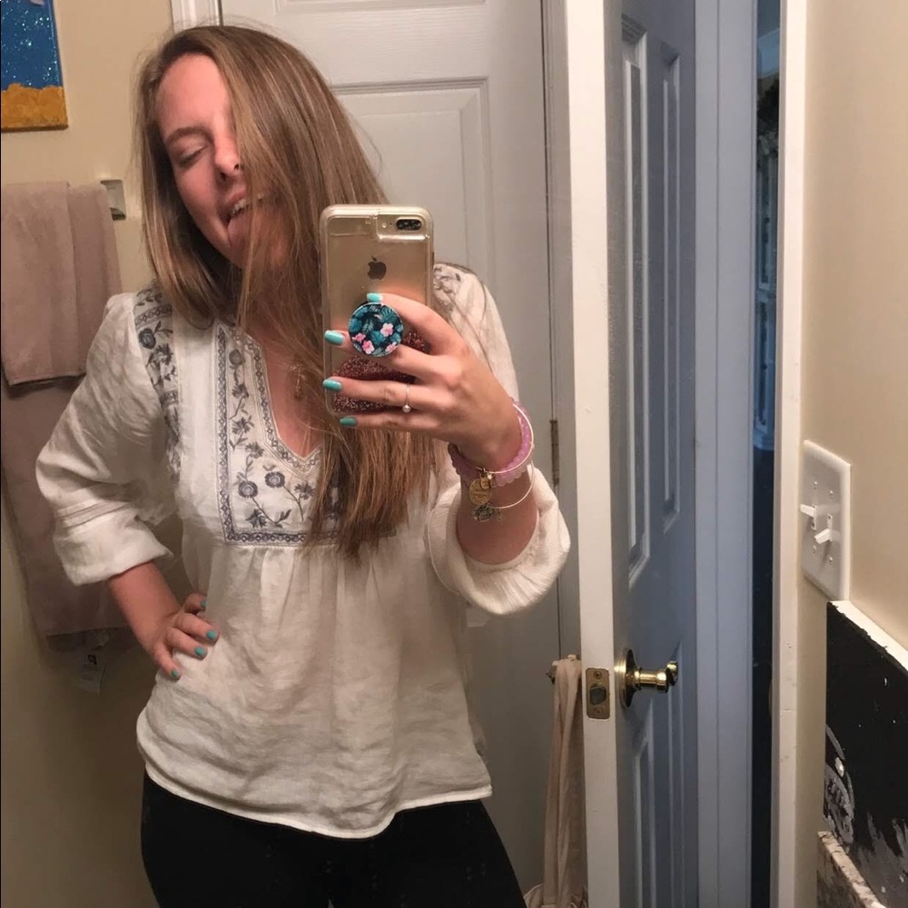 white and blue long sleeve